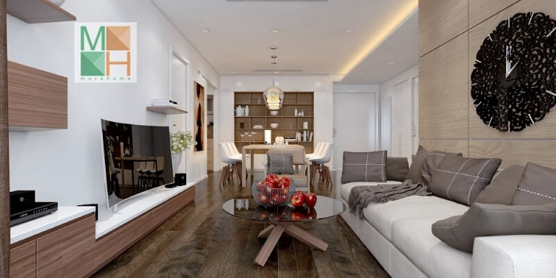 Thiết kế nội thất phòng khách chung cư nhỏ gọn với kệ ti vi treo tường kết hợp bộ sofa màu trắng với gối tựa màu ghi tạo điểm nhấn nổi bật cho căn phòng Thiết kế phòng khách chung cư