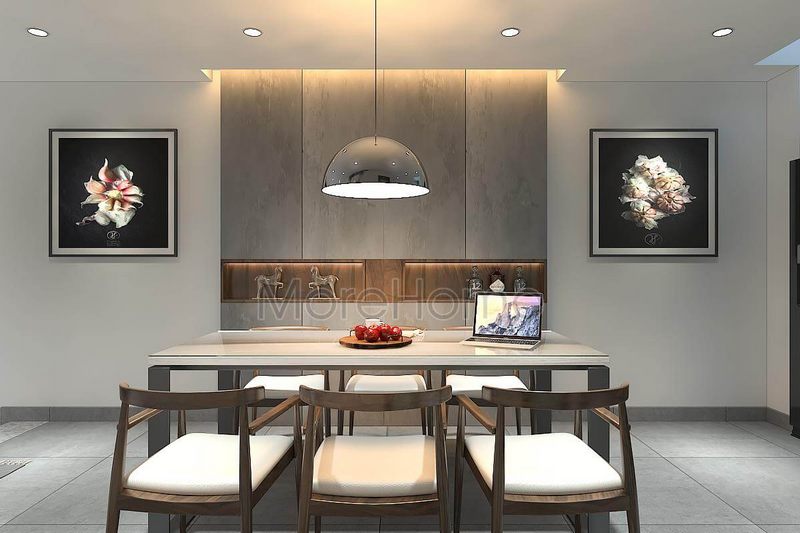 Trang trí phòng ăn đơn giản với thiết kế tranh treo tường họa tiết nhẹ nhàng và đèn chùm thả trần là điểm nhấn cho căn phòng