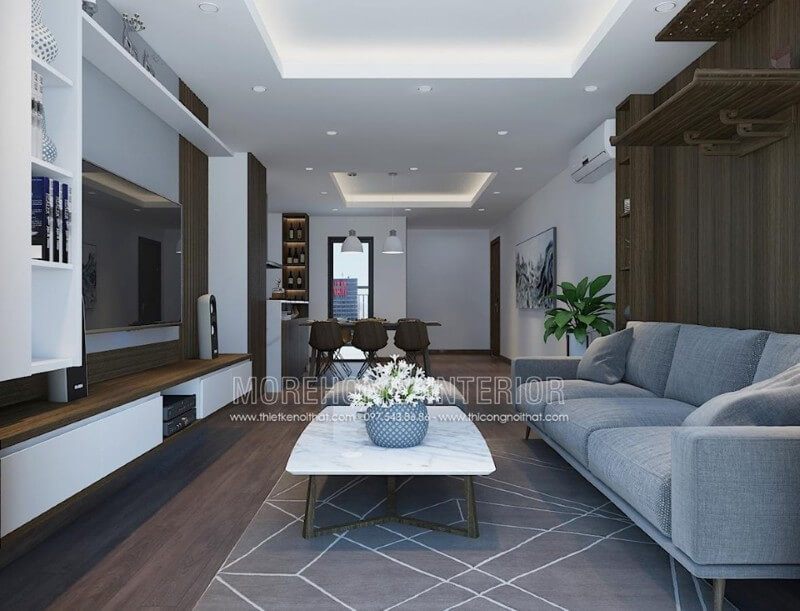 Sofa vải màu xanh trẻ trung là điểm nhấn nổi bật cho không gian phòng khách